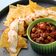 Chili con carne with cheese corn chips