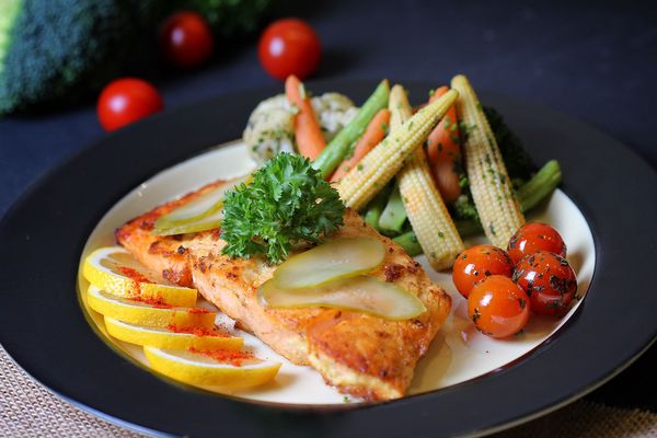 Grilled Salmon with Pesto Quinoa and Seasonal Vegetables