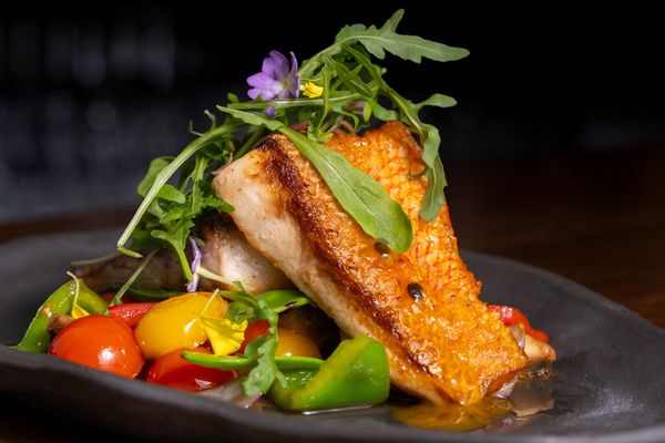 Grilled Seabass with escalivada and romesco sauce
